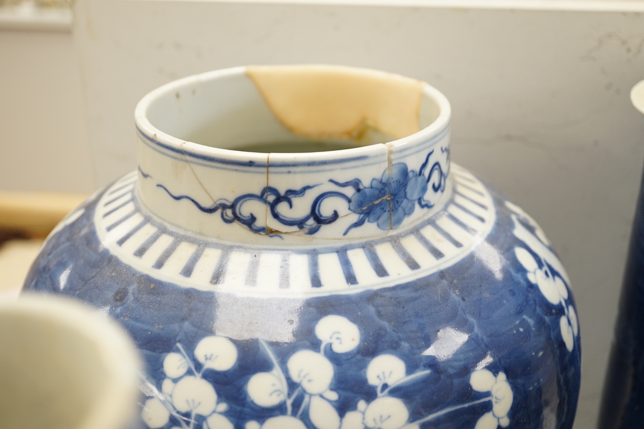 A Chinese blue and white Buddhist lion moon flask, a baluster vase, three sleeve vases and two others, 19th century, tallest 33cms (a.f.)